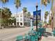 Outdoor seating at cafes along a tree-lined street at 1055 Philippe Pkwy, Safety Harbor, FL 34695