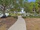 Relaxing waterfront area with shaded picnic tables and benches at 1055 Philippe Pkwy, Safety Harbor, FL 34695