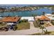 Aerial view of a waterfront property with RV parking at 11651 Grove St, Seminole, FL 33772