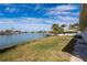 Enjoy waterfront views from this home's expansive backyard at 11651 Grove St, Seminole, FL 33772