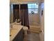 Bathroom featuring a shower/tub combo, modern vanity, and neutral tones at 1294 Clays Trl # 1294, Oldsmar, FL 34677