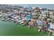 Waterfront home with private docks, beach access, and potential for new construction on adjacent lot at 14157 N Bayshore Dr, Madeira Beach, FL 33708