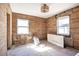 Bathroom renovation, featuring original wood walls at 15804 Redington Dr, Redington Beach, FL 33708
