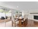 Bright dining room with hardwood floors and access to the backyard at 15804 Redington Dr, Redington Beach, FL 33708