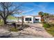 Updated bungalow exterior boasts a charming curb appeal at 15804 Redington Dr, Redington Beach, FL 33708