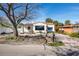 Charming single-story home with a newly renovated exterior and spacious front yard at 15804 Redington Dr, Redington Beach, FL 33708