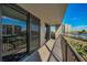 Spacious balcony with sliding doors and water views at 1660 Gulf Blvd # 307, Clearwater Beach, FL 33767