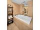 Relaxing bathtub with a built-in jetted system at 1660 Gulf Blvd # 307, Clearwater Beach, FL 33767