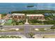 Aerial view of waterfront community and tennis court at 1695 Pinellas Bayway S # E4, Tierra Verde, FL 33715