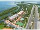 Aerial view of waterfront community with tennis court at 1695 Pinellas Bayway S # E4, Tierra Verde, FL 33715