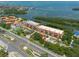 Aerial view of waterfront community with pool and tennis court at 1695 Pinellas Bayway S # E4, Tierra Verde, FL 33715