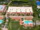 Community features a pool, spa, and convenient parking at 1695 Pinellas Bayway S # E4, Tierra Verde, FL 33715