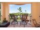 Private balcony with seating and scenic views of the surrounding area at 1695 Pinellas Bayway S # E4, Tierra Verde, FL 33715