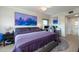 King bedroom with large windows, city view and a built in workspace at 1695 Pinellas Bayway S # E4, Tierra Verde, FL 33715