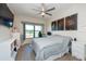 Bright bedroom with a comfortable bed, large window, and plenty of space at 1695 Pinellas Bayway S # E4, Tierra Verde, FL 33715