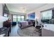 Spacious main bedroom with large TV, king-size bed and workspace at 1695 Pinellas Bayway S # E4, Tierra Verde, FL 33715