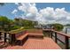 Relaxing boat dock with seating area and water access at 1695 Pinellas Bayway S # E4, Tierra Verde, FL 33715