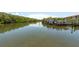 Serene canal view with lush vegetation at 1695 Pinellas Bayway S # E4, Tierra Verde, FL 33715