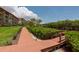 Private dock and walkway leading to waterfront at 1695 Pinellas Bayway S # E4, Tierra Verde, FL 33715