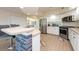 Modern kitchen featuring stainless steel appliances at 1695 Pinellas Bayway S # E4, Tierra Verde, FL 33715