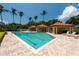 Community lap pool with covered seating at 1695 Pinellas Bayway S # E4, Tierra Verde, FL 33715