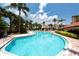 Community pool with ample lounge space at 1695 Pinellas Bayway S # E4, Tierra Verde, FL 33715