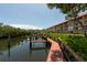 Waterfront property with boat docks and walkway at 1695 Pinellas Bayway S # E4, Tierra Verde, FL 33715