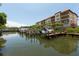 Stunning waterfront view with boat slips and building at 1695 Pinellas Bayway S # E4, Tierra Verde, FL 33715