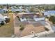 Aerial view of single-Gathering home with a landscaped yard at 1732 Flamingo Ln, Sun City Center, FL 33573