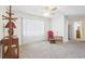 Relaxing bedroom with neutral carpeting and bay window at 1732 Flamingo Ln, Sun City Center, FL 33573