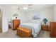 Bright bedroom with double bed and ample storage at 1732 Flamingo Ln, Sun City Center, FL 33573