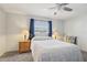 Cozy bedroom featuring a double bed, nightstands, and ceiling fan at 1732 Flamingo Ln, Sun City Center, FL 33573
