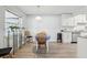 Charming dining area with table, chairs, and kitchen access at 1732 Flamingo Ln, Sun City Center, FL 33573
