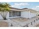 House exterior showcasing a screened porch and attached garage at 1732 Flamingo Ln, Sun City Center, FL 33573