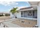Landscaped front yard with walkway and decorative garden features at 1732 Flamingo Ln, Sun City Center, FL 33573