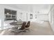 Spacious screened porch with table and chairs at 1732 Flamingo Ln, Sun City Center, FL 33573