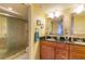 Clean bathroom with double vanity and a separate shower at 18400 Gulf Blvd # 1505, Indian Shores, FL 33785