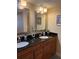 Double vanity bathroom with granite countertop at 18400 Gulf Blvd # 1505, Indian Shores, FL 33785