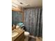 Clean bathroom with shower/tub combo and updated vanity at 18400 Gulf Blvd # 1505, Indian Shores, FL 33785