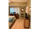 Second bedroom with comfortable furnishings and large window at 18400 Gulf Blvd # 1505, Indian Shores, FL 33785