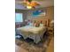 Spacious bedroom with king-size bed and ceiling fan at 18400 Gulf Blvd # 1505, Indian Shores, FL 33785
