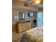 Bedroom with dresser and large mirror at 18400 Gulf Blvd # 1505, Indian Shores, FL 33785