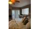 King-size bed with views from sliding doors at 18400 Gulf Blvd # 1505, Indian Shores, FL 33785
