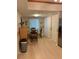 Casual dining area adjacent to the kitchen, with laminate flooring at 18400 Gulf Blvd # 1505, Indian Shores, FL 33785