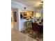 Dining area with kitchen pass-through and bar stools at 18400 Gulf Blvd # 1505, Indian Shores, FL 33785