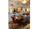 Dining area with a wooden table and comfortable seating at 18400 Gulf Blvd # 1505, Indian Shores, FL 33785