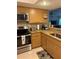 Updated kitchen with granite countertops and stainless steel appliances at 18400 Gulf Blvd # 1505, Indian Shores, FL 33785