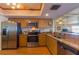 Updated kitchen, featuring stainless steel appliances and granite countertops at 18400 Gulf Blvd # 1505, Indian Shores, FL 33785