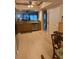 Bright kitchen with light wood cabinets and laminate flooring at 18400 Gulf Blvd # 1505, Indian Shores, FL 33785