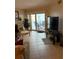 Living room with balcony access and ocean view at 18400 Gulf Blvd # 1505, Indian Shores, FL 33785